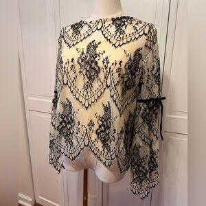 Chic black and white lace blouse